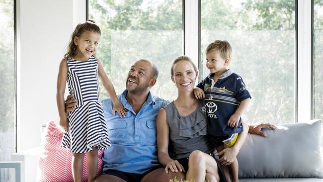 ##Embargo – Qweekend only## Former Australian cricketer Andrew Symonds at home in Townsville. Andrew with wife Laura and children, Chloe, 4 and Billy, 2. Photo Mark Cranitch.