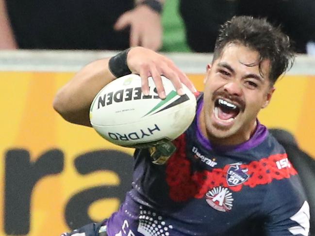 MELBOURNE, AUSTRALIA - APRIL 25:  Young Tonumaipea of the Melbourne Storm scores a try during the round eight NRL match between the Melbourne Storm and New Zealand Warriors at AAMI Park on April 25, 2018 in Melbourne, Australia.  (Photo by Scott Barbour/Getty Images)