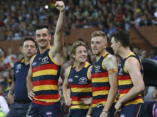 Jake Lever (far right) is looking forward to playing against former skipper Taylor Walker and his mates. Picture: Sarah Reed