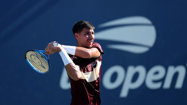 NEW YORK, NEW YORK - AUGUST 28: Alexei Popyrin of Australia returns a shot against Pedro Martinez Portero of Spain during their Men's Singles Second Round match on Day Three of the 2024 US Open at USTA Billie Jean King National Tennis Center on August 28, 2024 in the Flushing neighbourhood of the Queens borough of New York City. (Photo by Luke Hales/Getty Images)