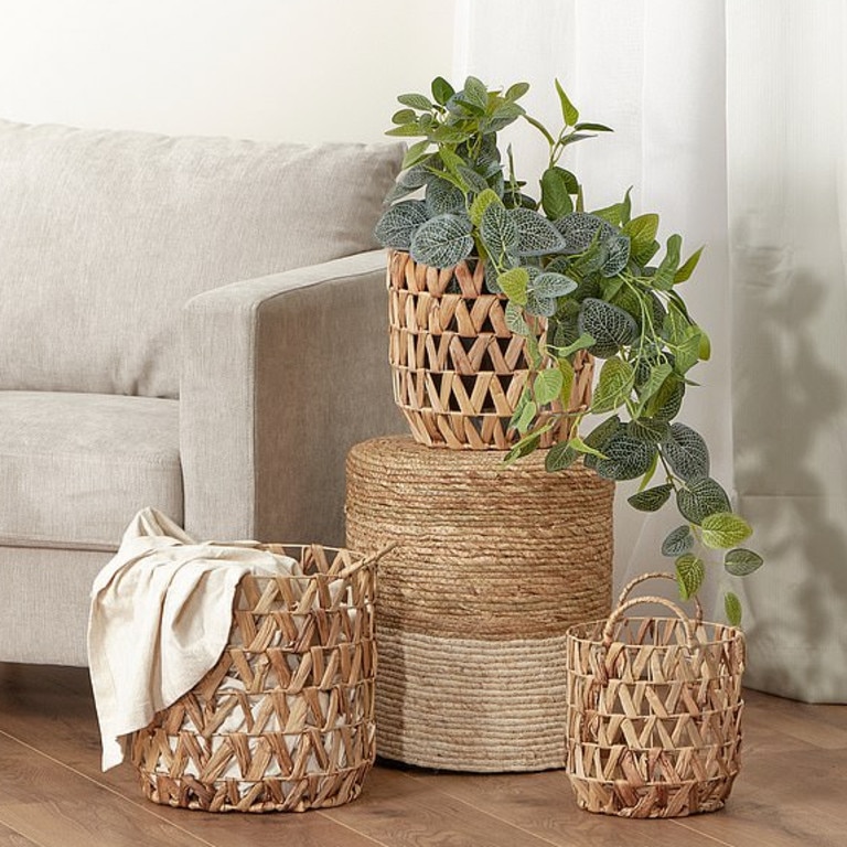 Add some greenery into the home with lifelike faux plants including a large fiddle leaf fig in a woven basket for $49.95. Picture: Supplied