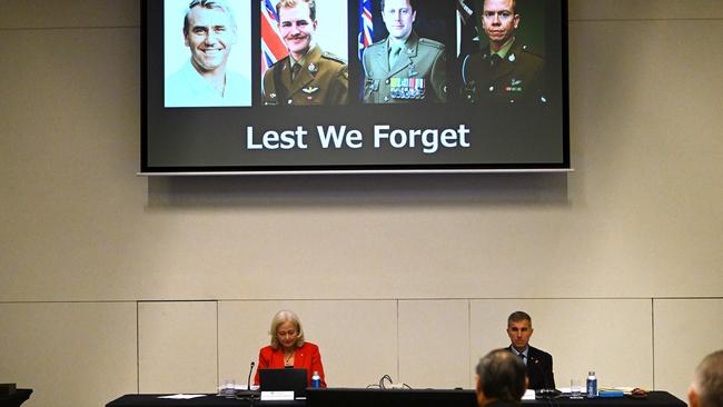 Former Justice Margaret McMurdo AC and Air Vice-Marshal Joe Iervasi AM CSC observe a minute silence at the start of the inquiry into the deaths of four ADF members. Picture: Dan Peled / NCA NewsWire