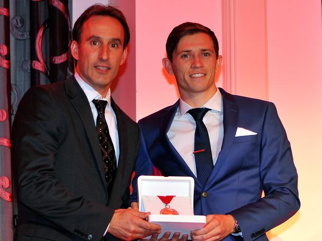 Aurelio Vidmar (left) presents Craig Goodwin with the Club Champion award during the 2016 Adelaide United awards night. Picture: David Mariuz/Getty Images