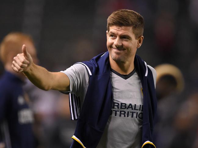 FILE - In this Feb. 9, 2016, file photo, Los Angeles Galaxy midfielder Steven Gerrard, of England, gestures to fans after a soccer match against Club Tijuana, in Carson, Calif. Gerrard is leaving the LA Galaxy after two seasons, and the former England midfielder is still considering what to do next. (AP Photo/Mark J. Terrill, File)