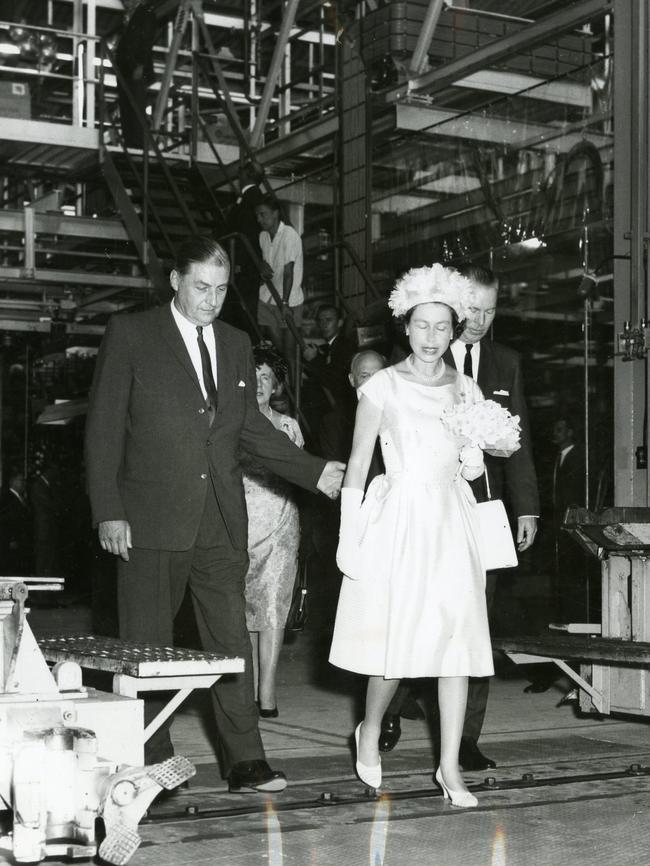 The Queen inspects the GM-H plant with managing director J. Kingston Stuart in 1963.