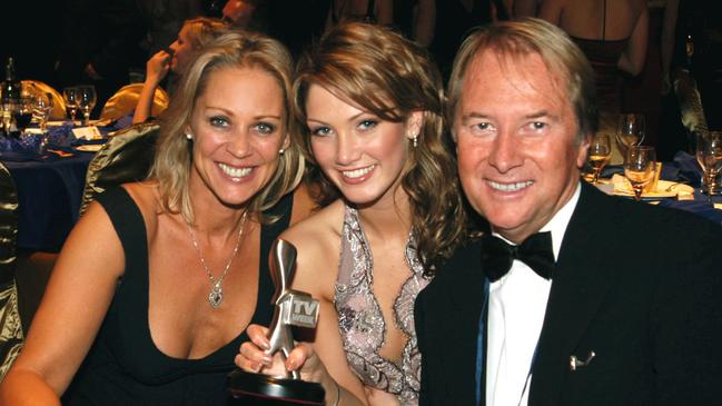 Wheatley with singer Delta Goodrem, centre, and wife Gaynor at the 2003 Logie Awards in Melbourne.