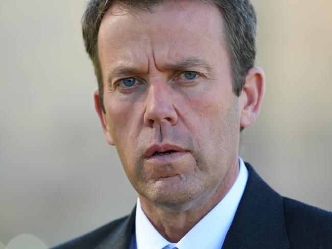 Australia's Veterans' Affairs Minister Dan Tehan speaks to the media during a press conference in front of the War Memorial in Canberra, Sunday, May 7, 2017.  (AAP Image/Lukas Coch) NO ARCHIVING