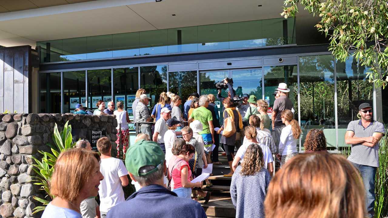 Community members try to gain admission to Sekisui forum outside Sekisui House after they were not invited.  Photo: John McCutcheon / Sunshine Coast Daily. Picture: John McCutcheon