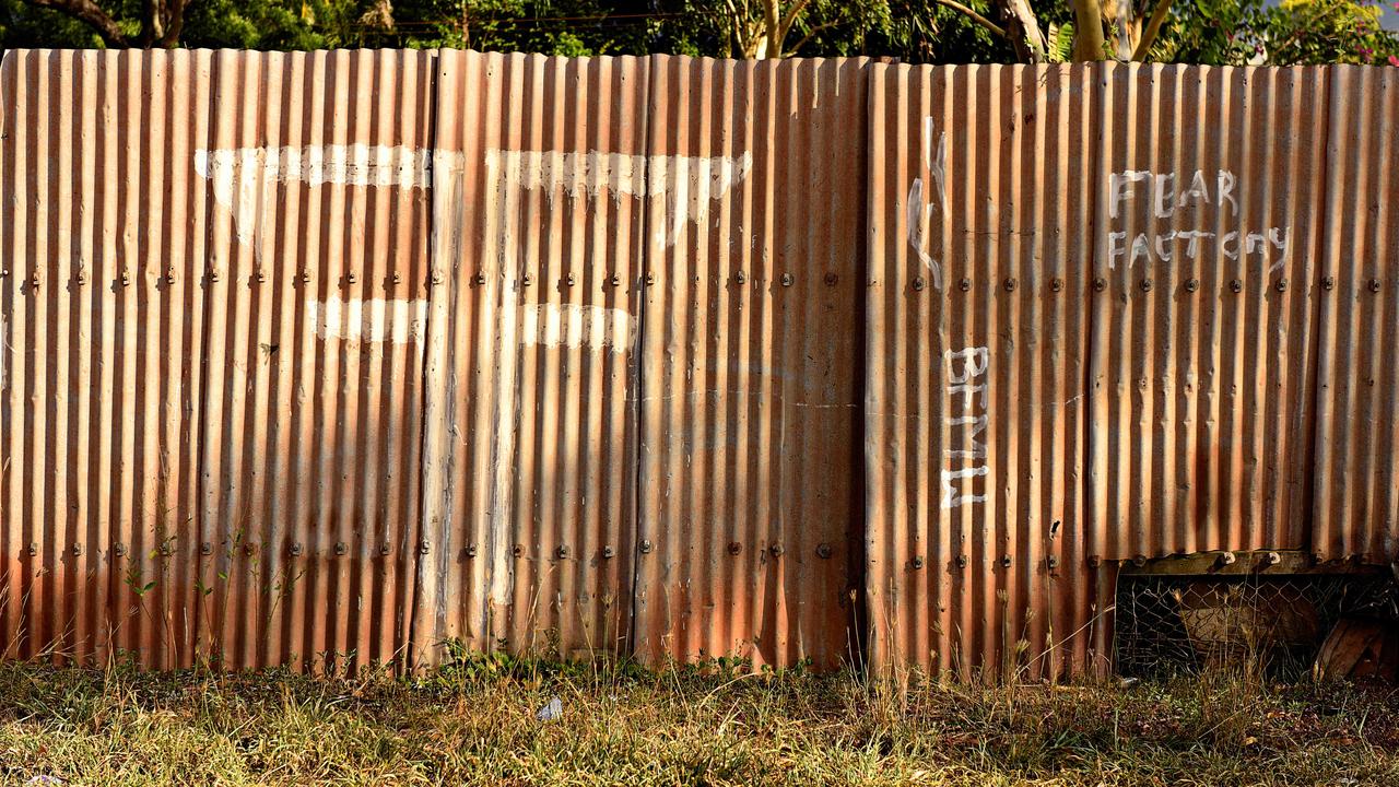 Fear Factory logos graffitied onto a fence in Wadeye.