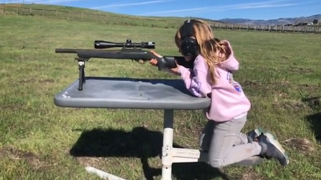 Pink's daughter Willow shoots a riffle