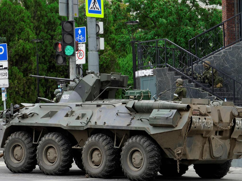 An armoured personnel carrier is parked in a street as members of the Wagner group patrol an area in the centre of Rostov-on-Don. Picture: Stringer/AFP