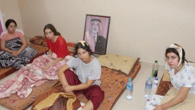 (L – R) Liri Albag, Agam Berger, Daniella Gilboa, and Karina Ariev, at an unknown location during the early days of captivity. Picture: AFP