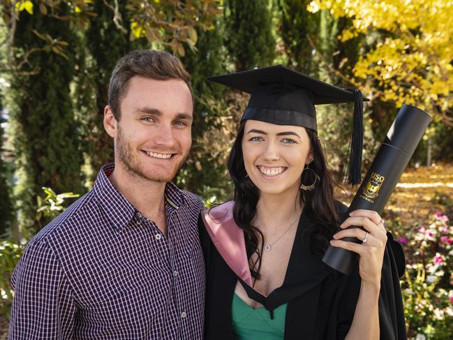 Bachelor of Education (Early Childhood) graduate Jenna Pedler celebrates with Mason Hartog at a UniSQ graduation ceremony at Empire Theatres, Tuesday, June 27, 2023. Picture: Kevin Farmer