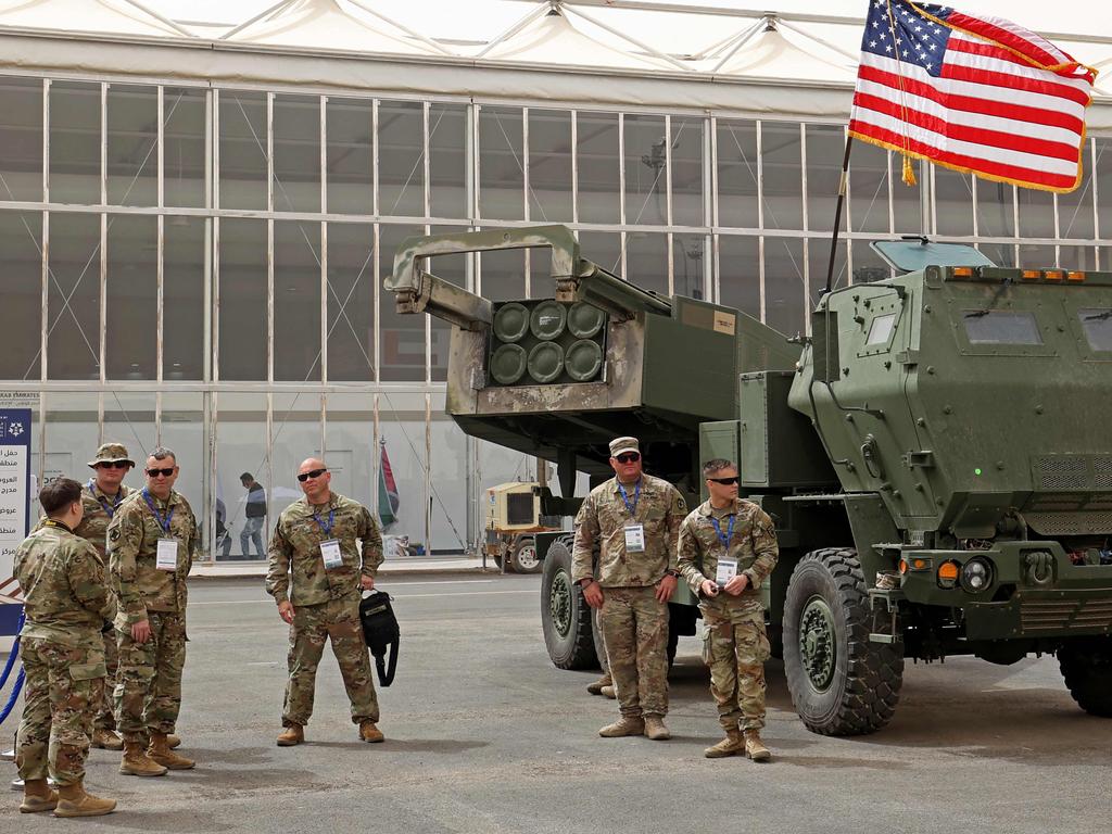 US military personnel stand by a HIMARS at a defence show in Saudi Arabia. Picture: Fayez Nureldine/AFP