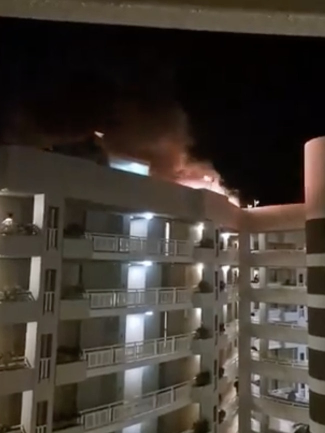 Up to 400 people were evacuated from the DoubleTree Hotel by Hilton about 1.50am on Monday after a R44 Robinson helicopter crashed into the roof. Picture: 9 News