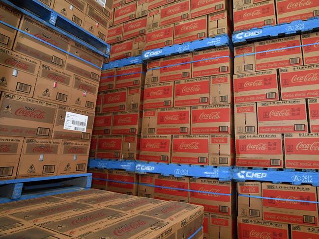 Boxes of Coca-Cola bottles are seen at Coca Cola AmatilÃâ¢s new bottling and warehouse facility at Richlands in Brisbane, Tuesday, October 2, 2018. Coca Cola AmatilÃâ¢s has spent $165 million on the bottling and warehouse facility to make it the companyÃâ¢s largest in Australia.  (AAP Image/Darren England) NO ARCHIVING