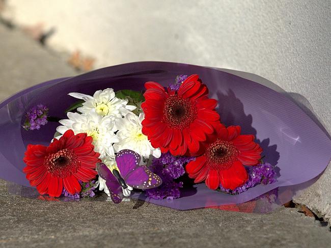 Flowers are left at the Ristevski house in Avondale Heights. Picture: Mark Stewart