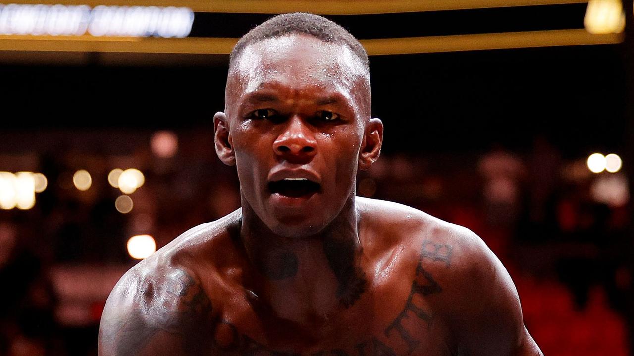 MIAMI, FLORIDA - APRIL 08: Israel Adesanya of Nigeria celebrates after knocking out Alex Pereira of Brazil in round 2 to reclaim the middleweight title during UFC 287 at Kaseya Center on April 08, 2023 in Miami, Florida. Carmen Mandato/Getty Images/AFP (Photo by Carmen Mandato / GETTY IMAGES NORTH AMERICA / Getty Images via AFP)