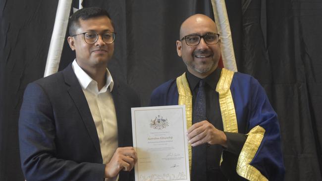 Mohammed Tanzid Ridwan Hossain, from Bangladesh, pictured with Deputy Lord Mayor Vim Sharma, became an Australian citizen on Australia Day. Picture: Sierra Haigh