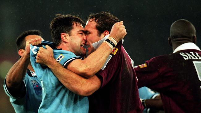 Arguably the greatest photo in rugby league folklore: Terry Hill &amp; Gordon Tallis face off in State of Origin Game II, 1999. Picture: Trent Parke.