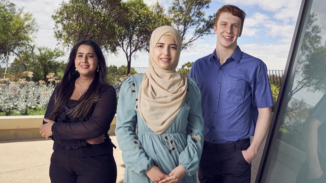 High achieving students Tooba Mumtaz, Maram Salim, and Gabriel Cregan have all been honoured at this year’s Governor of South Australia Commendations for Excellence in SACE. Picture: Matt Loxton