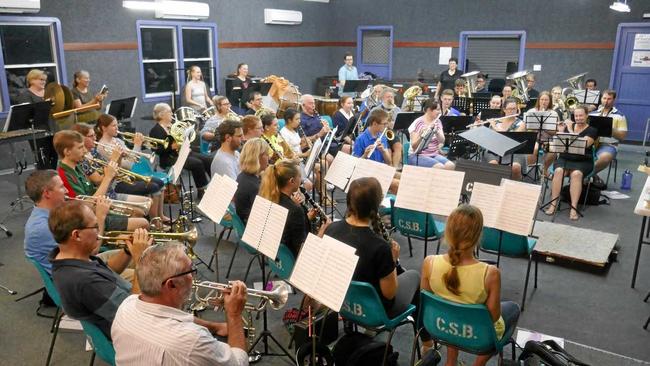 Jeanette Douglas (standing at right of back) - Conductor of Capricornia Winds overseeing rehearsal. Picture: contributed