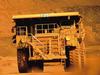 A truck works at the BHP Billiton iron ore mine at Mt Whaleback at Newman in the Pilbara, in undated image released 24/08/05 with teh Anglo-Australian resources group BHP Billiton announced a record full-year net profit.