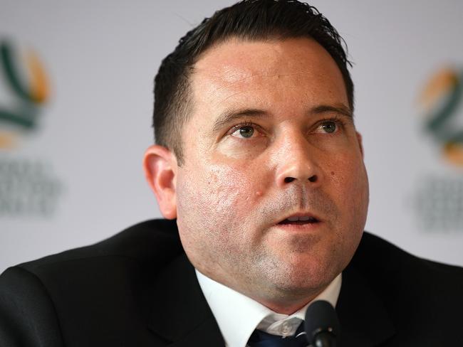 Football Federation Australia (FFA) Chief Executive Officer James Johnson speaks to the media during a press conference in Sydney, Tuesday, March 24, 2020. (AAP Image/Joel Carrett) NO ARCHIVING