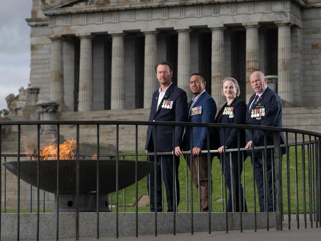 Bryan Ross, Jon Saemo, Carolyn West and John Willis at the front of the Shrine of Remembrance. Picture: Tony Gough