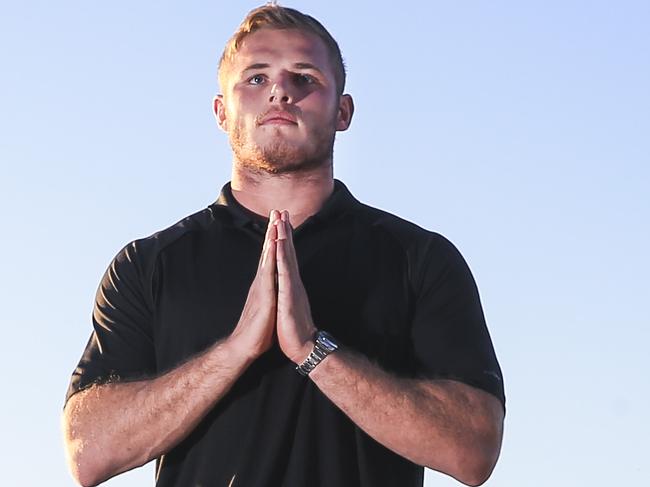 Tom Burgess doing yoga near Neilson Park.  Picture: Dylan Robinson EMBARGO FOR BEST WEEKEND JUNE 10