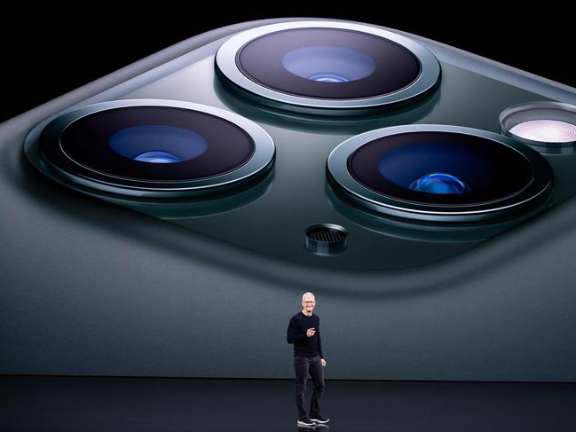 TOPSHOT - Apple CEO Tim Cook speaks on-stage during a product launch event at Apple's headquarters in Cupertino, California on September 10, 2019. - Apple unveiled its iPhone 11 models Tuesday, touting upgraded, ultra-wide cameras as it updated its popular smartphone lineup and cut its entry price to $699. (Photo by Josh Edelson / AFP)