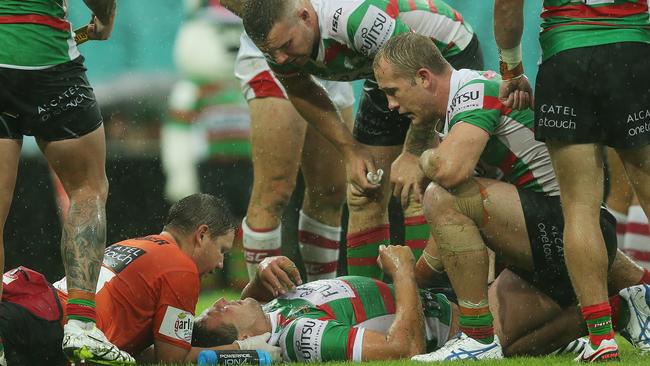 Sam Burgess is attended to following a sickening collision at the SCG. Picture: Brett Costello