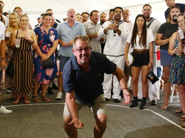 The Anzac Day dawn service was held at the cenotaph on Cairns Esplanade. Phil Chiplen of Earlville threw 10 consecutive heads at two up at the Cairns RSL club. PICTURE: BRENDAN RADKE