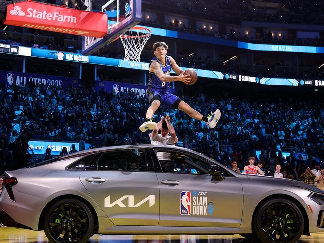 SAN FRANCISCO, CALIFORNIA - FEBRUARY 15: Mac McClung #0 of the Osceola Magic dunks the ball during the 2025 AT&T Slam Dunk Contest as part of the State Farm All-Star Saturday Night at Chase Center on February 15, 2025 in San Francisco, California. NOTE TO USER: User expressly acknowledges and agrees that, by downloading and or using this photograph, User is consenting to the terms and conditions of the Getty Images License Agreement.   Ezra Shaw/Getty Images/AFP (Photo by EZRA SHAW / GETTY IMAGES NORTH AMERICA / Getty Images via AFP)