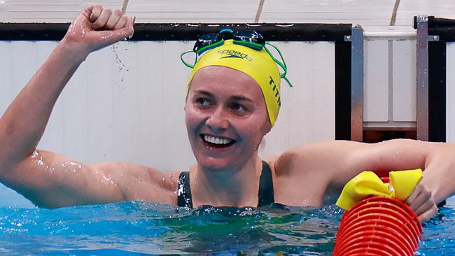 Australia's Ariarne Titmus reacts after taking gold in the final of the women's 400m freestyle swimming event during the Tokyo 2020 Olympic Games at the Tokyo Aquatics Centre in Tokyo on July 26, 2021. (Photo by Odd ANDERSEN / AFP)