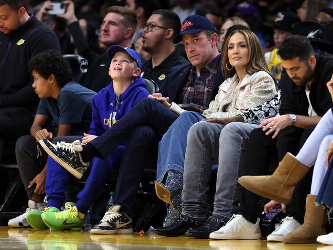 Ben Affleck and Jennifer Lopez look on from the front row during the first half of a game between the Golden State Warriors and the Los Angeles Lakers in March. Picture: Getty Images