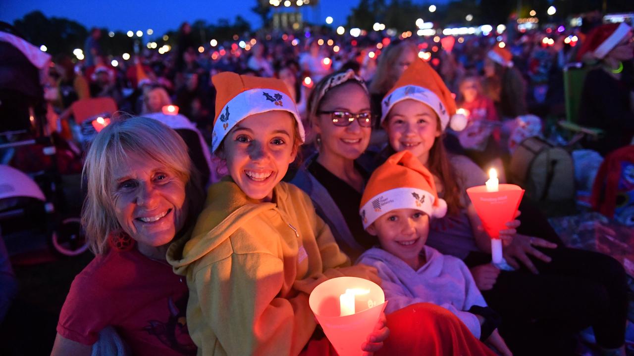 Judy Baird with Emma, Lorinda Wishart, Lucy and Brielle at last year’s Carols by Candlelight. Picture: AAP / Keryn Stevens