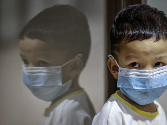 A child wearing a face mask in Manila, Philippines. Picture: Ezra Acayan/Getty