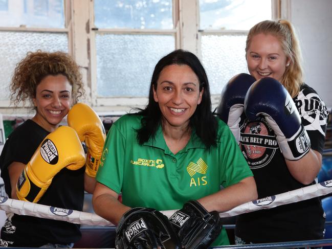 (L-R) Rachel Taliana, Cindy Fenech and Laura Majewski  pose for a photograph at Punch Blackbelt Pro Gym Randwick, Wednesday 27 July, 2017.  (AAP Image/CRAIG WILSON)