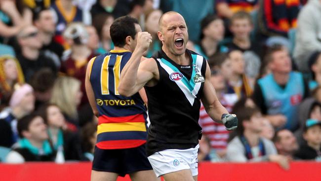 Chad Cornes celebrates kicking the opening goal of Showdowm XXXI.