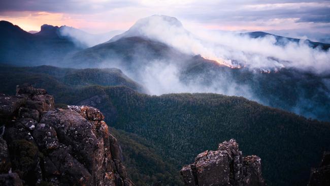 View from the summit of Mt Oakleigh showing the southern fire front on the flanks of Pelion West. The bushfire has now impacted the Overland Track in the Cradle Mountain-Lake St Clair National Park. Picture: Shaun Mittwollen