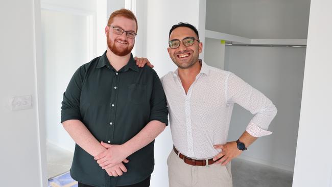 MyHome shared equity scheme participant, Josh, whose first house at Rokeby is currently under construction, with Parliamentary Secretary for Housing and Planning, Simon Behrakis. Picture: Supplied