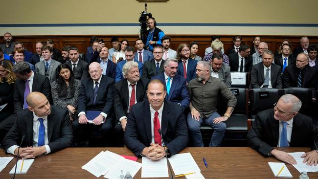 Ryan Graves, left, David Grusch and David Fravor. Picture: Drew Angerer/Getty Images/AFP