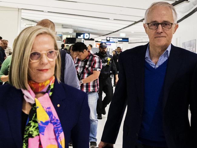 The Turnbulls at Sydney International Airport today, flying to New York after Malcolm Turnbull quit politics and the seat of Wentworth. Pictures: Jenny Evans