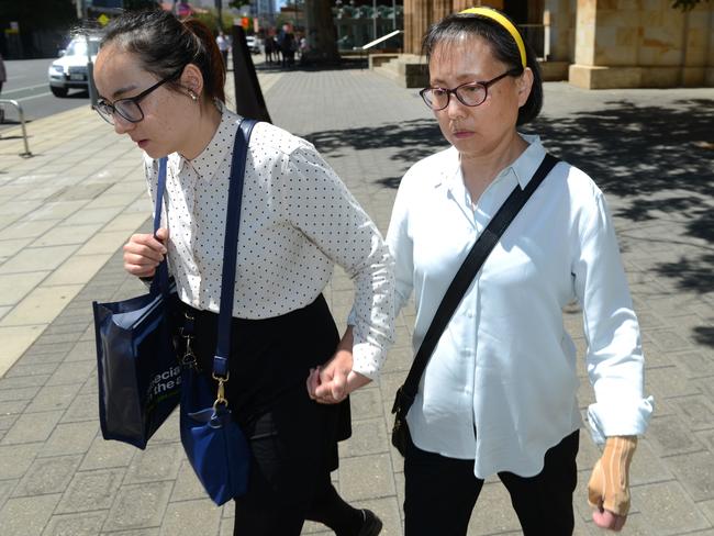  Victim Tai Ho, right, leaves court with her daughter Elsha Freedman. Picture: AAP Image/Brenton Edwards