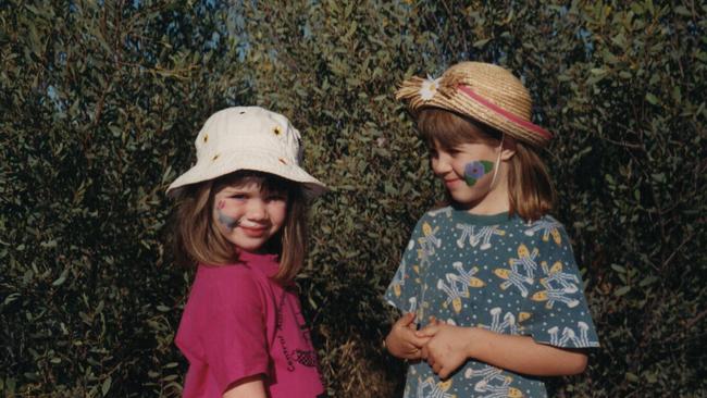 Rachael and younger sister Sophie at the Alice Springs desert park in 2001. Picture: SUPPLIED