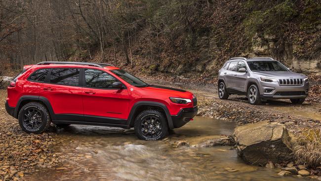 Rough and smooth: Cherokee Trailhawk, left, and Cherokee Limited.