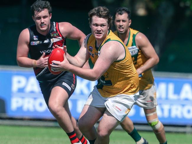 Kobe Hodges carries the ball for St Mary’s against Tiwi Bombers in Round 2 of the NTFL. Picture: Glenn Campbell