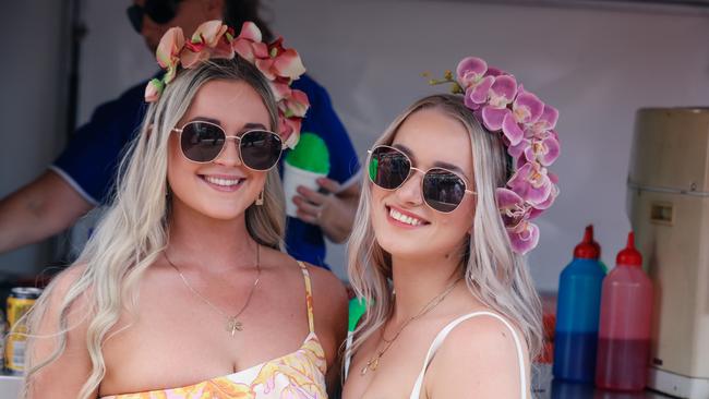 Having a ball at The Great Northern Darwin Cup at Fannie Bay Turf Club are Hailey Reddey and Shailisse Keirs. Picture: Glenn Campbell