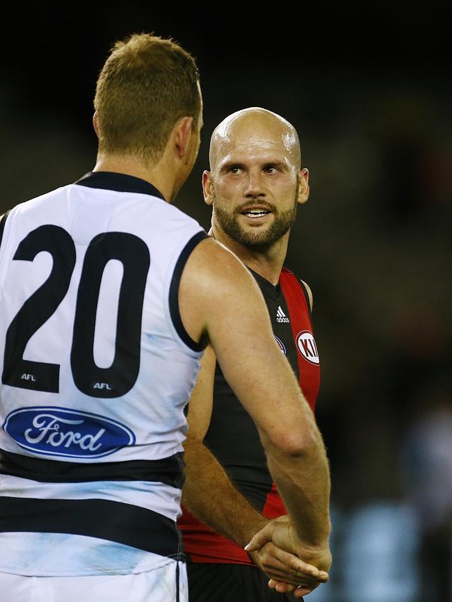 Mutual respect between Johnson and Chapman, after the latter’s move to Essendon. Picture: Wayne Ludbey